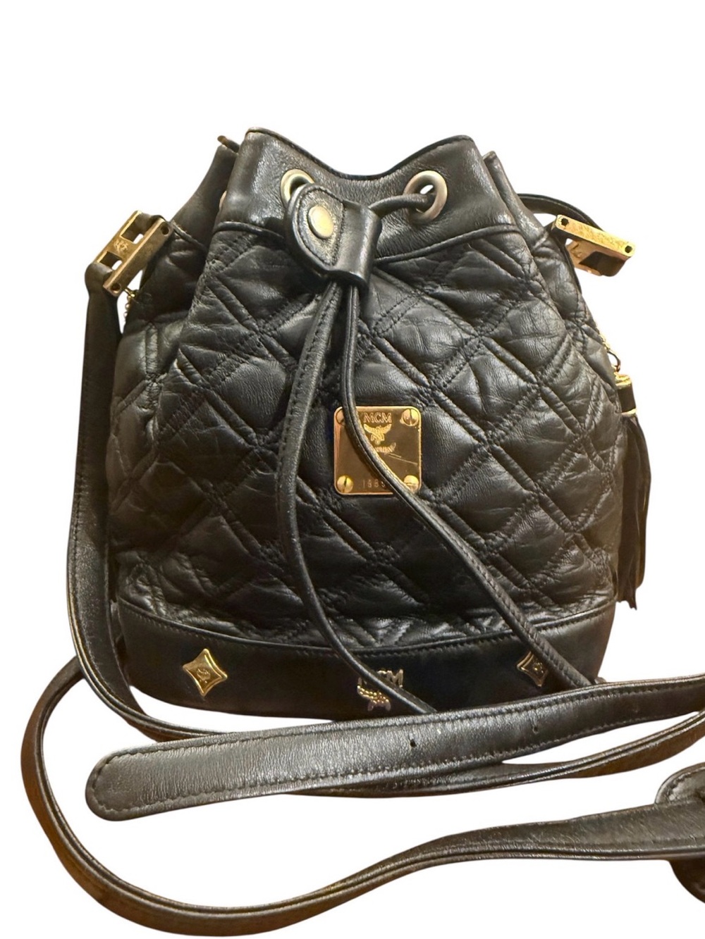 MCM Black Quilted Leather Drawstring Backpack with Gold Hardware